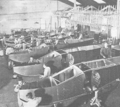 Model A floats lined up in the Baldwin plant