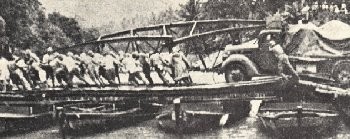 Japanese troops crossing a bridge, Java island, March 1942