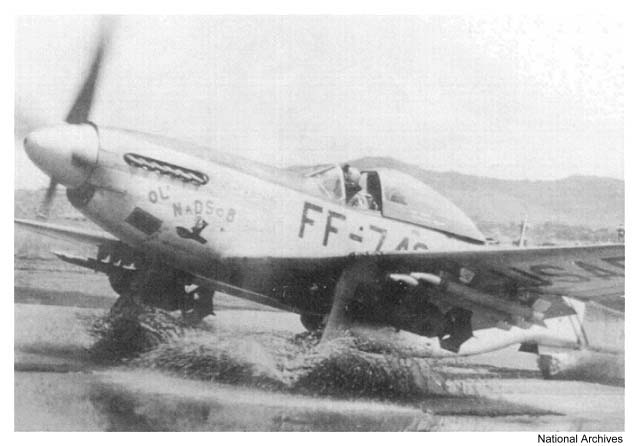 F-51D taxis through ponding rain water