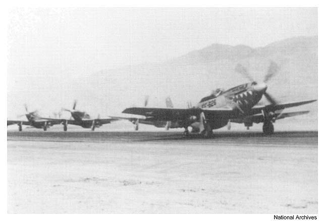 F-51Ds loaded with 500 lb bombs